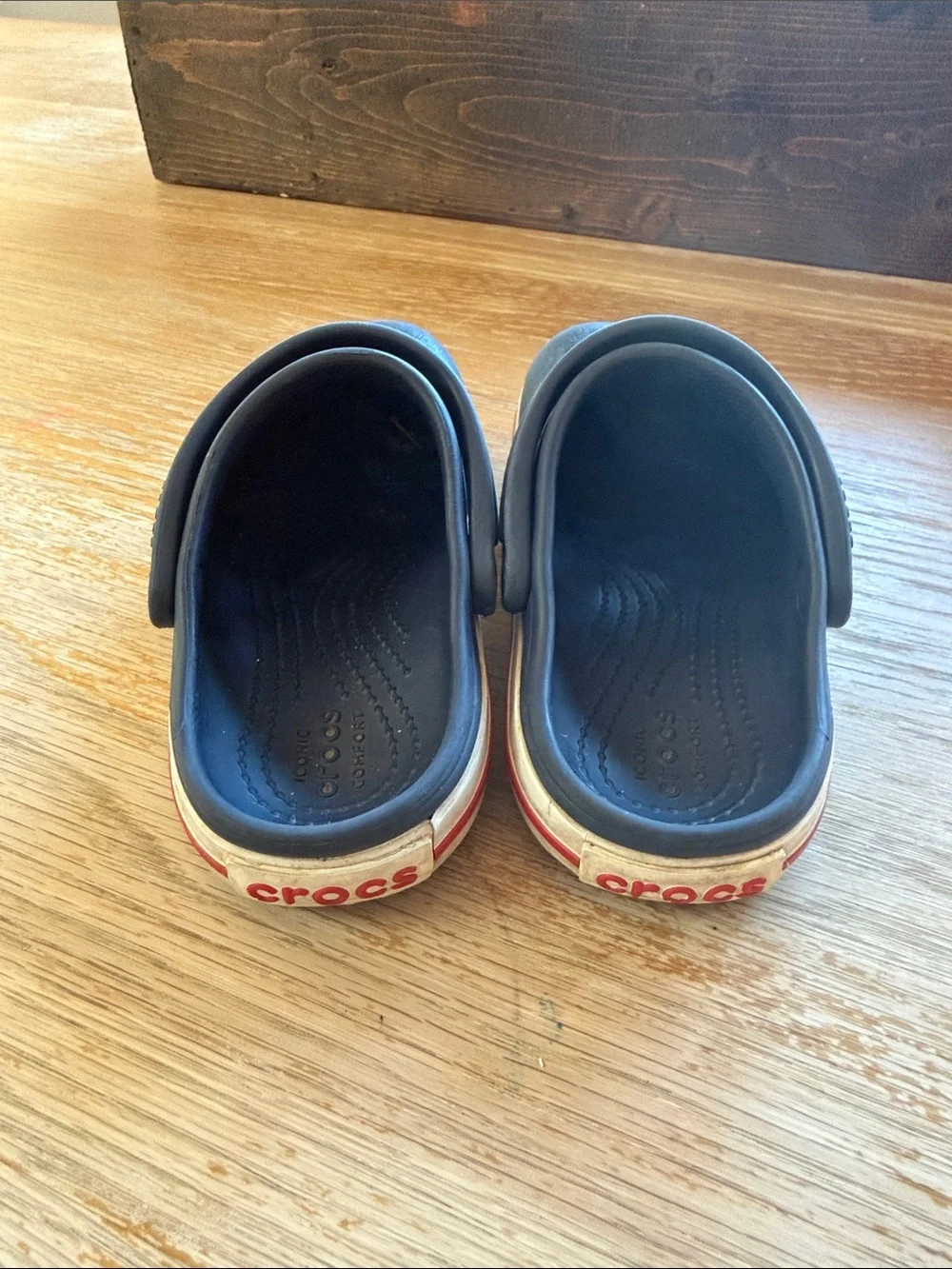 CROCS Kids Navy Clogs with Red Stripe Accent